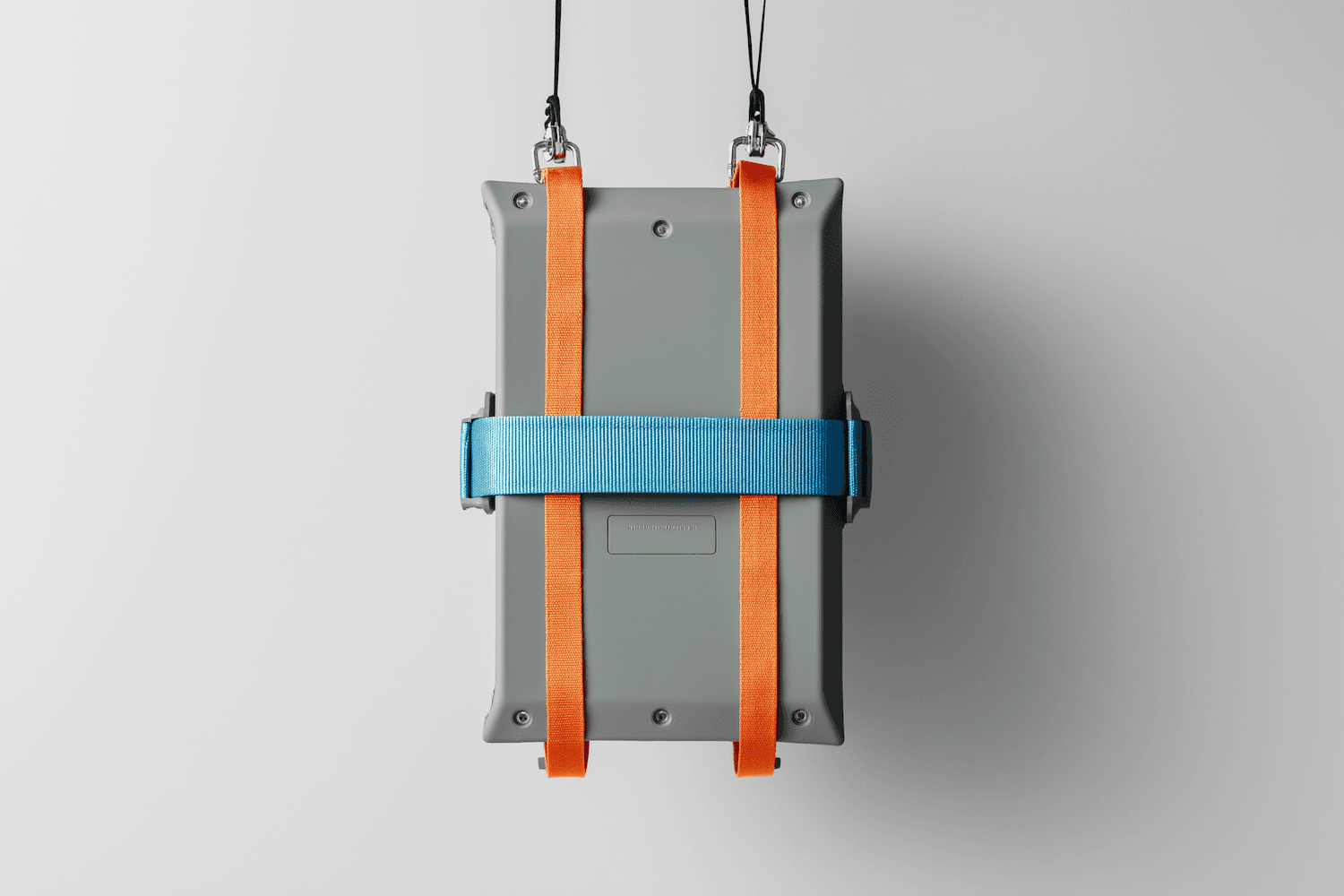 Modular container unit rigged with lifting straps ready for placement